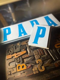 Image 2 of P-A-P-A | concertina letterpress card | fluoro blue