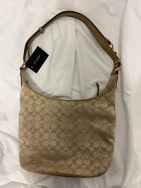 Image 3 of 2012 Coach monogram hobo shoulder bag with a beige and gold floral appliqué design