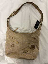 Image 7 of 2012 Coach monogram hobo shoulder bag with a beige and gold floral appliqué design