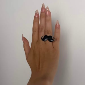 Image of enamel mustache rings!