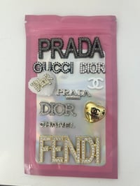 10x mixed metal charms,