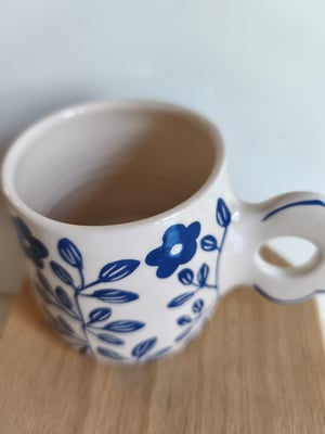 Image of tasse anse fleur , bleu