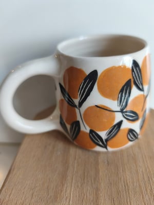 Image of   Petite  tasse anse pois brun