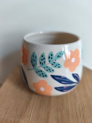 Image of  Petite  tasse ronde fleur orange 
