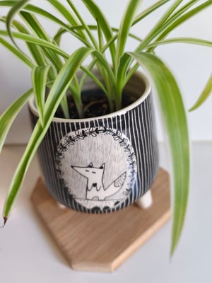 Image of    Pot trépied loup