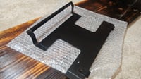 Image 1 of 70-73 240z Rear License plate holder - New Reproduction 