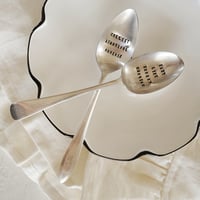 Image 1 of stamped serving spoon 