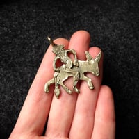 Image 1 of Riding the donkey backward, in bronze