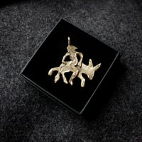 Image 2 of Riding the donkey backward, in bronze