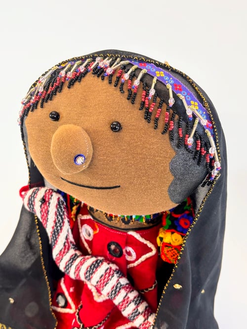 Image of Kamaykia the animal whisperer and her snake Sissy