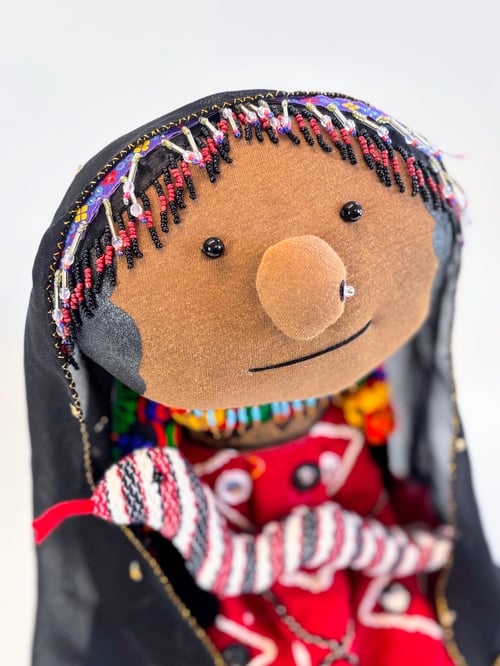 Image of Kamaykia the animal whisperer and her snake Sissy