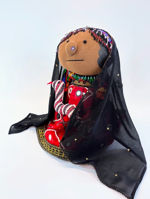 Image of Kamaykia the animal whisperer and her snake Sissy