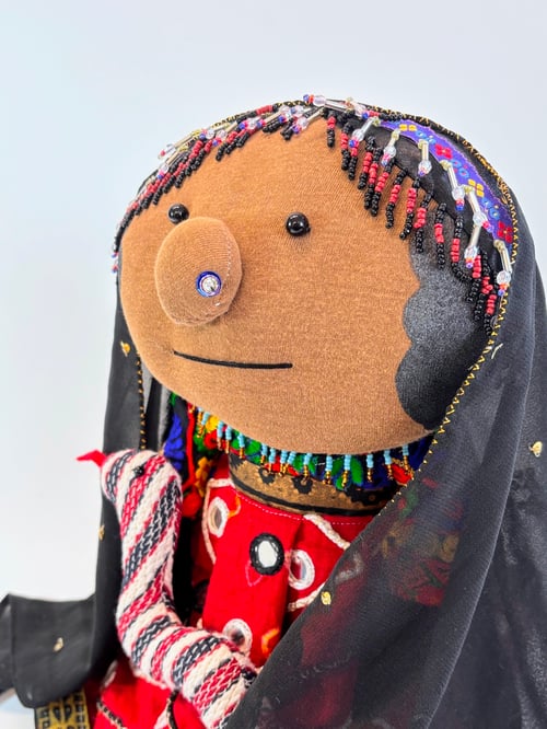 Image of Kamaykia the animal whisperer and her snake Sissy