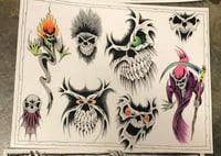 Hand colored skulls 11x14