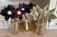 Image 1 of Memory Flowers custom created from a clients loved ones lovely collection of tops