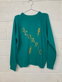 Image 1 of Scorpio teal L (21"p2p, 26"s2h, 31"c2c) 