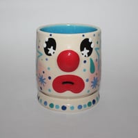 Image 1 of sad blue cup