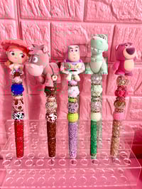 Image 2 of Disney Doorables Toy Story Keychain or Beaded pens ✨
