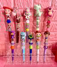Image 1 of Disney Doorables Toy Story Keychain or Beaded pens ✨