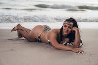 LAYING ON THE SAND SIGNED 8x10