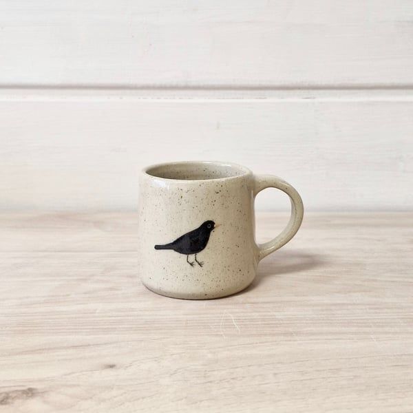 Image of Tasse à café merle