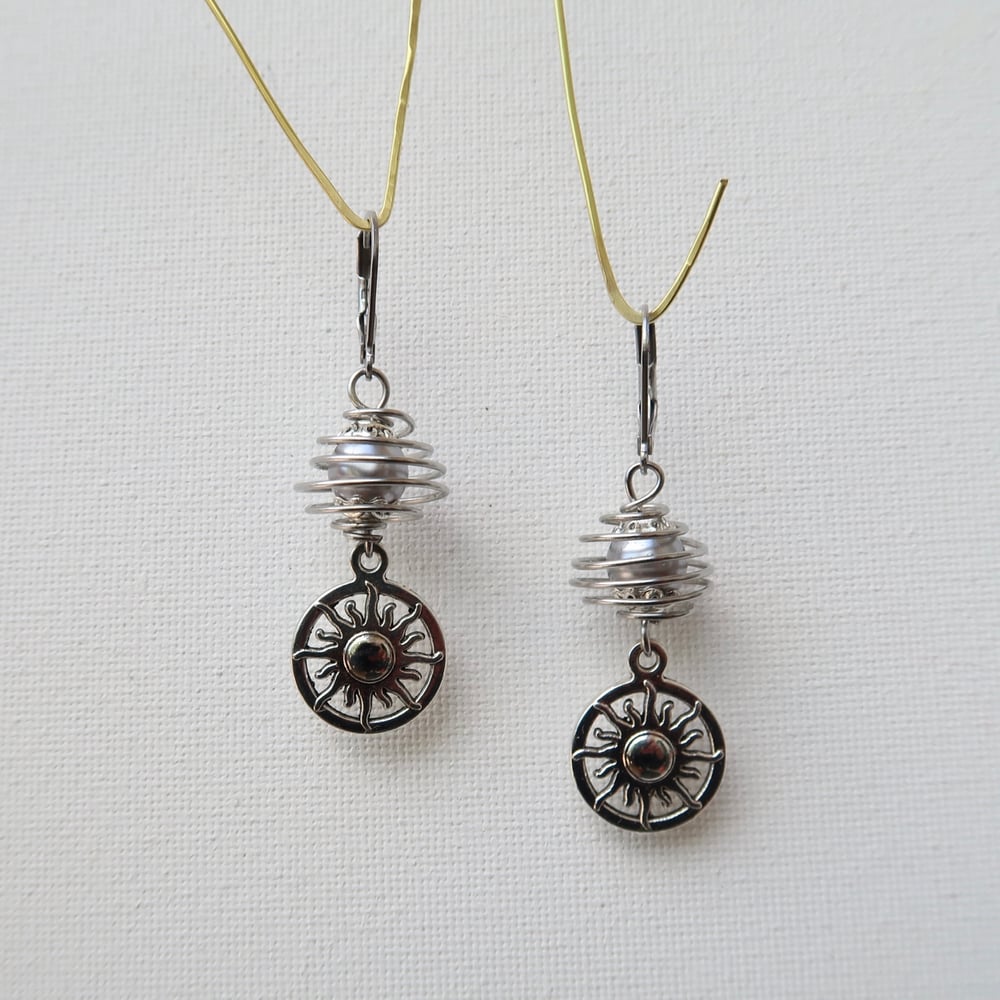 Image of Silver Sun Charm Wire Wrapped Earrings