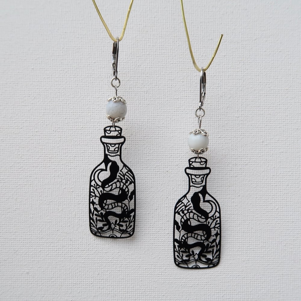 Image of White Bead Snake Bottle Earrings in Silver
