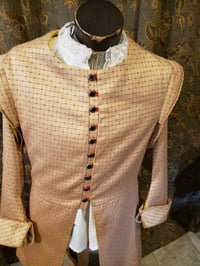 Image 1 of Mustard and red doublet