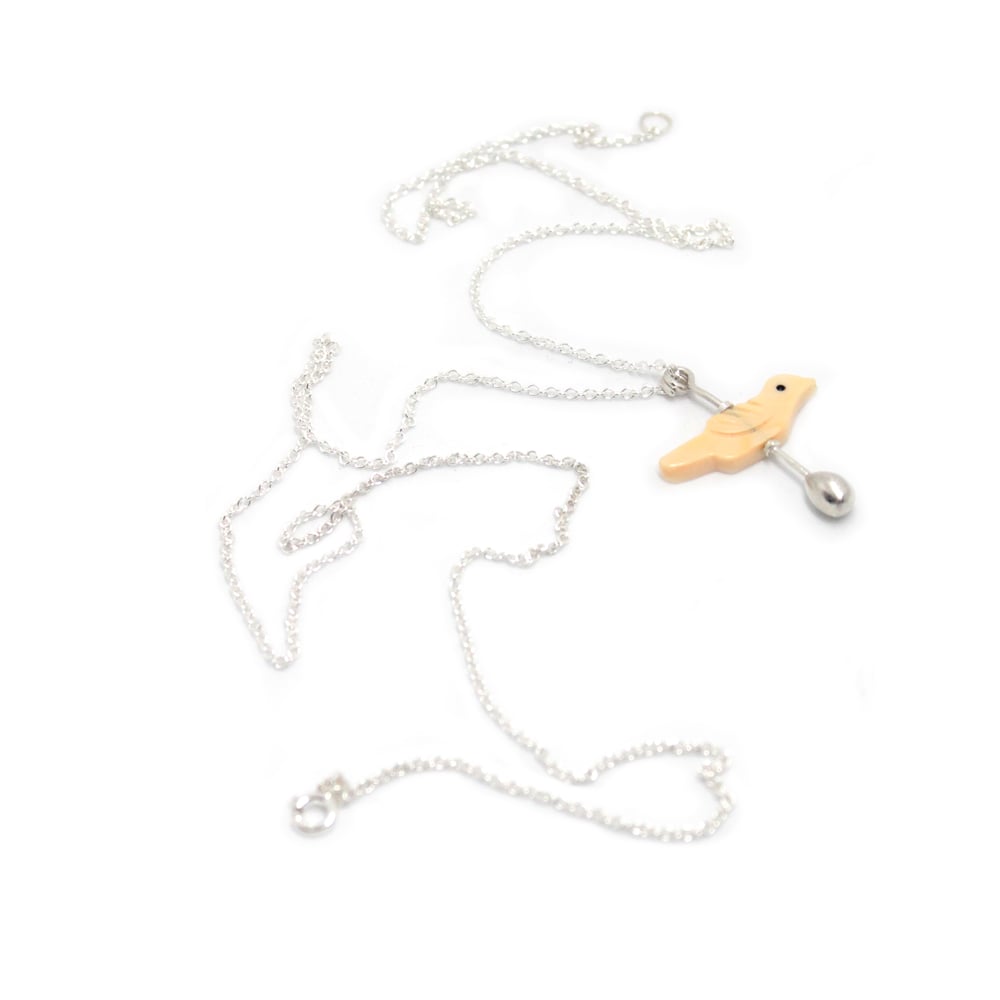 Image of EGG DROPPING BIRD NECKLACE