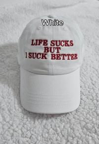 Image 1 of Life sucks but I suck better cap