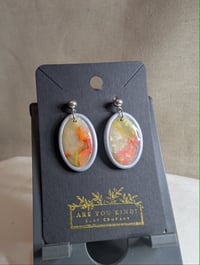 The Amber Nebula Ovals