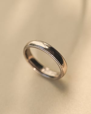 Image of 18ct white gold, 4mm milled edge ring