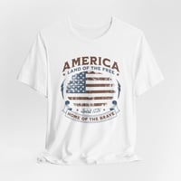 Image 1 of America Vintage Flag T-Shirt – "Land of the Free, Home of the Brave" Patriotic Tee