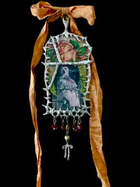 Image 1 of Large Frill-back Pigeon Talisman 