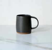 Image 1 of 16 oz mug in Black