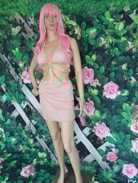 Image 1 of Women's three piece pink gold chain skirt swimsuit.