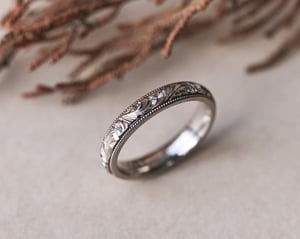 Image of 18ct White gold, 4mm Floral and milled edge engraved ring