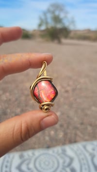 Image 1 of Red Ammolite in Brass