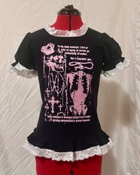 Image 1 of black x pink x white skull print cutsew