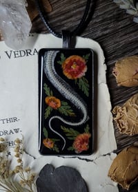 Image 2 of Snake Spine and Floral Amulet - Orange Floral