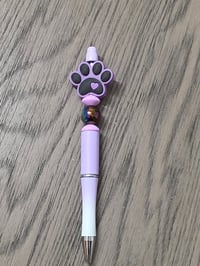 Purple pawprint pen