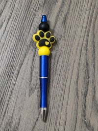 Yellow pawprint pen