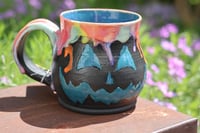 Image 1 of 14 Oz Teal and Rainbow Jack-O-Lantern Mug