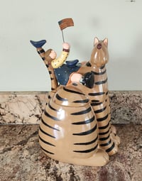 Image 1 of "Girl Riding Cat" Americana Cookie Jar