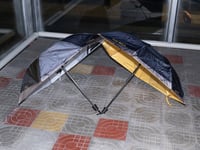 Image 8 of kova&Stasis Space&Lucas Blalock_ Break an Umbrella yellow text