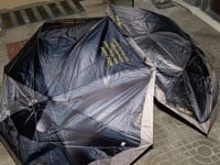 Image 3 of kova&Stasis Space&Lucas Blalock_ Break an Umbrella yellow text