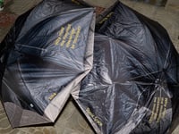 Image 11 of kova&Stasis Space&Lucas Blalock_ Break an Umbrella yellow text