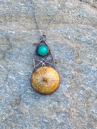 Image 2 of What Remains | Sand  dollar fossil pendant