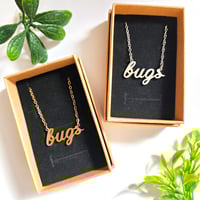Image 1 of 'bugs' Cursive Text Steel Necklace