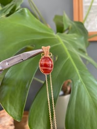 Image 3 of Gold Banded Carnelian Oval Crystal Necklace